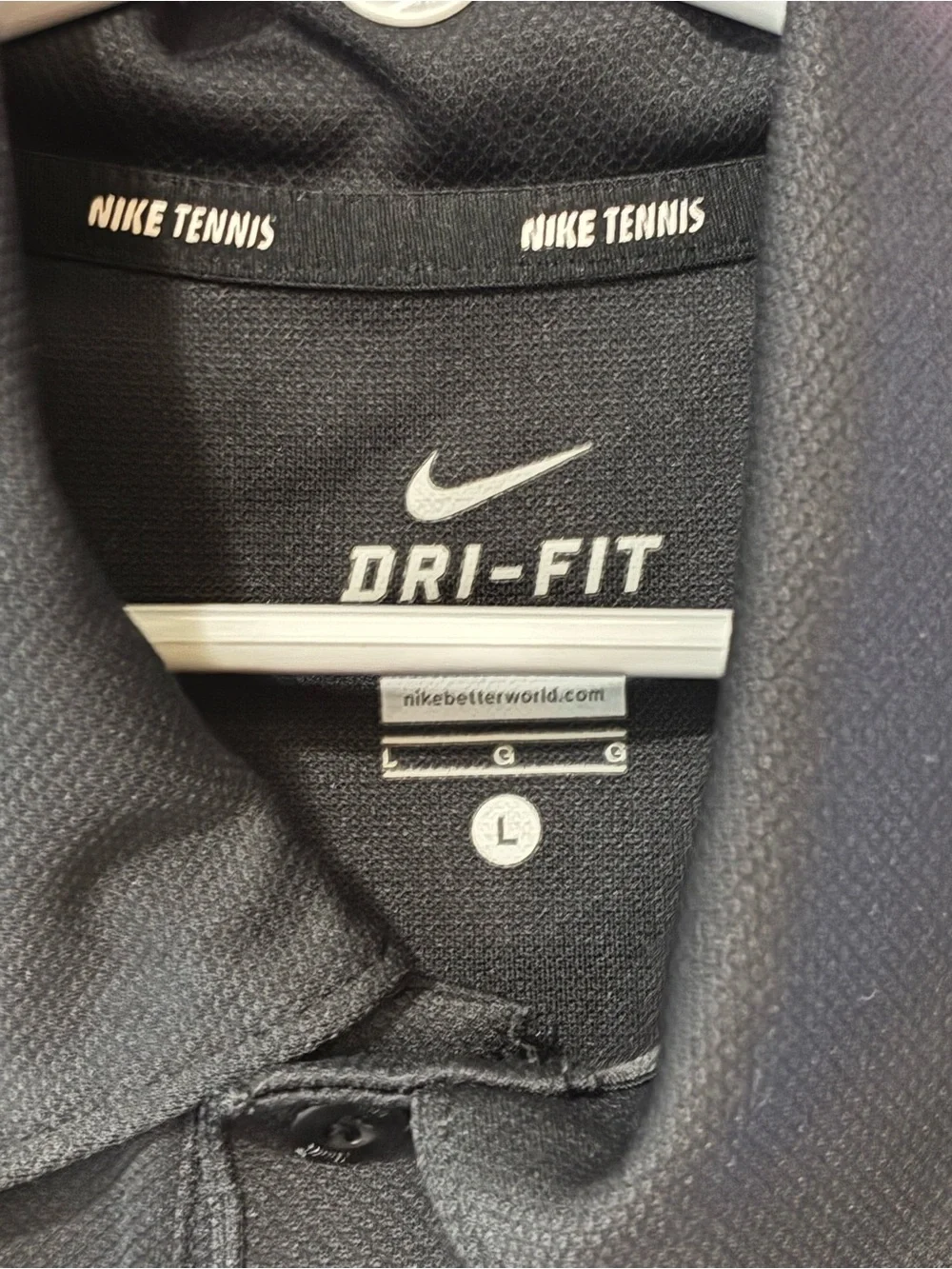 Nike Boys Black Polo with White Swoosh and Side Stripes